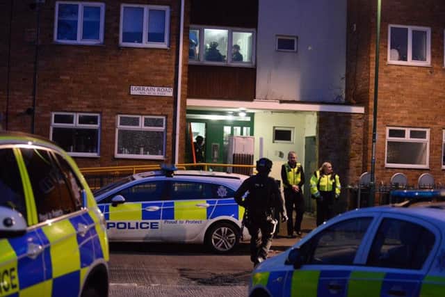 Police surround flats in South Shields.