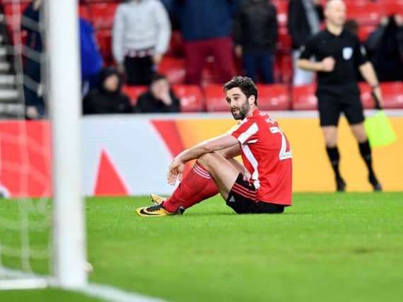 Will Grigg missed a golden chance to score on his home debut for Sunderland.