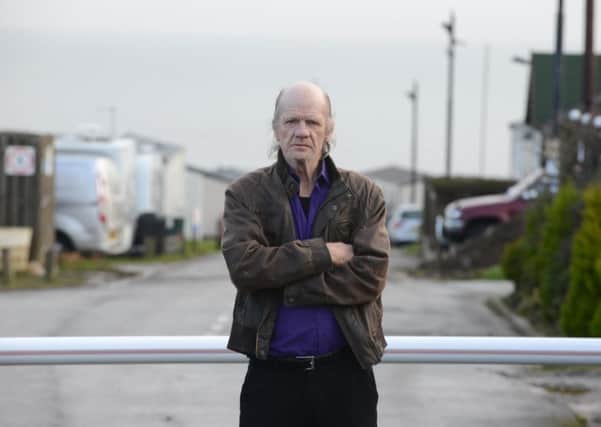 Lizard Lane Caravan Park resident Geoff Lynch angry over new owners site fees.