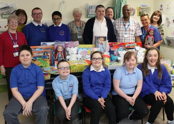 Pupils and staff from Keelmans Way School, Hebburn, handing over the gifts to at South Tyneside District Hospital