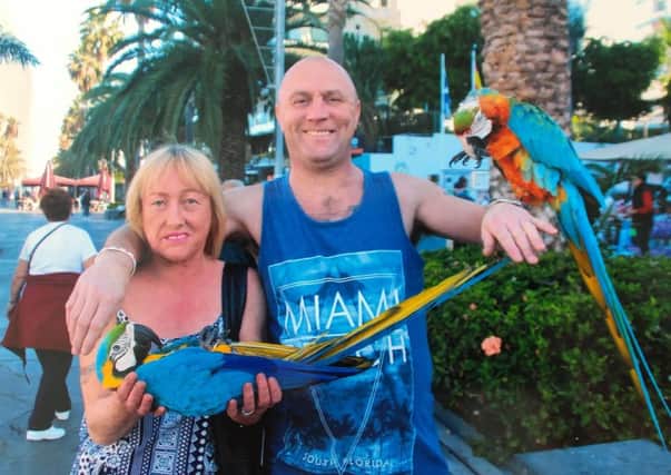 Robert Waugh and his partner Alison Higgins on holiday in Tenerife before the tragic fall