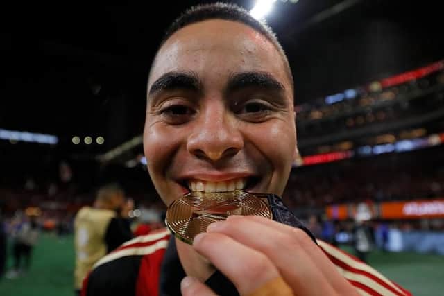 Miguel Almiron with his MLS Cup winners medal.