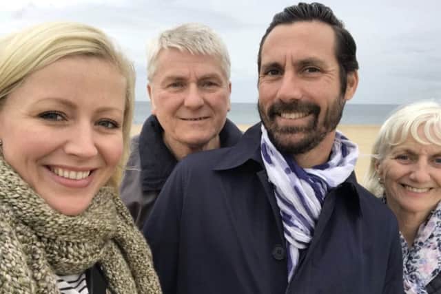Caroline with parents Carol and Laurie Renno, and husband Olivier Raynal on South Shields beach