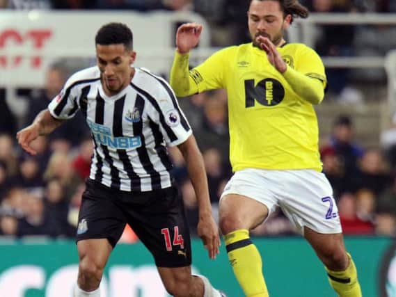 Isaac Hayden in action in the FA Cup earlier this season.