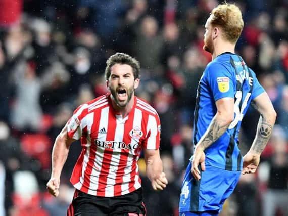 Will Grigg celebrates his first goal for Sunderland.