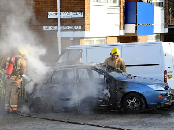 Firefighters tackle a car ablaze in South Shields