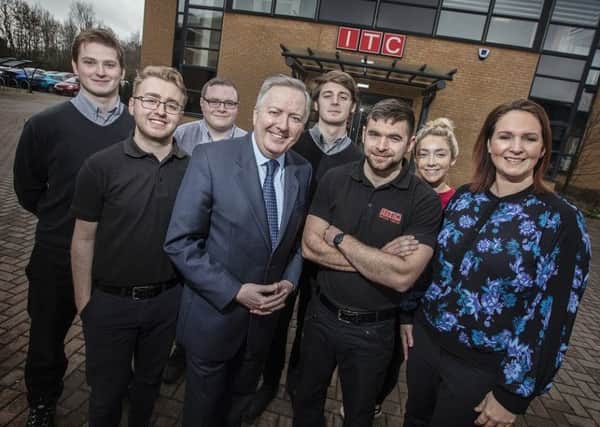 Coun Iain Malcolm (centre) with (from left) , ITC's Martyn Armstrong, Kieran Parkin, Adam Hill, Alex Graham, Jamie Blanchflower, Bethany Gibson and Kate Anderson