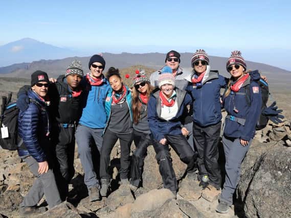 Team Kilimanjaro are celebrating after making it to the top of Africa's highest mountain. Pic Chris Jackson/Getty Images.