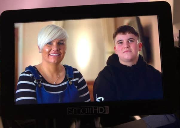 Robbie Drew and his mam Lizzy Stavers being filmed for More 4's new series of Emergency Helicopter Medics.