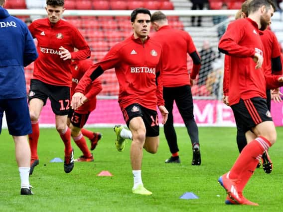 Sunderland players warming up before the win over Plymouth Argyle.