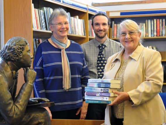 Friends of Whitburn Library secretary Marilyn Harding and chairman Rory Thomson with Coun Fay Cunningham.