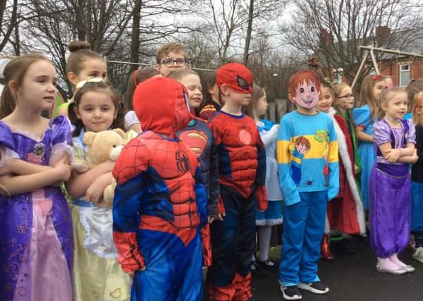 Pupils from St Bede's RC Primary School in Jarrow showed off their World Book Day costumes during a parade in the yard.