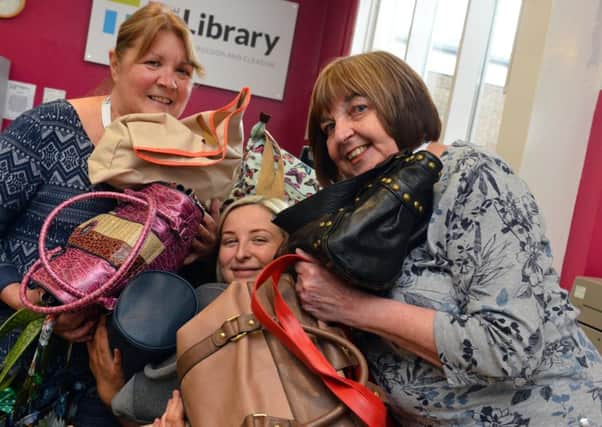 Volunteers at Boldon Library celebrate International Women's Day.  Gail Barkel, Laura McKeith and Val Scott