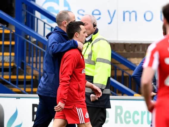 George Honeyman leaves the pitch.