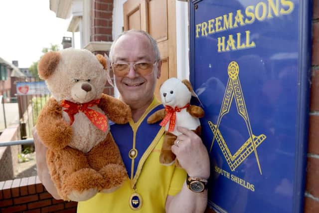 Freemason Kevin Carter holding Teddy Bears outside of the South Shields Masonic Hall. Picture by FRANK REID