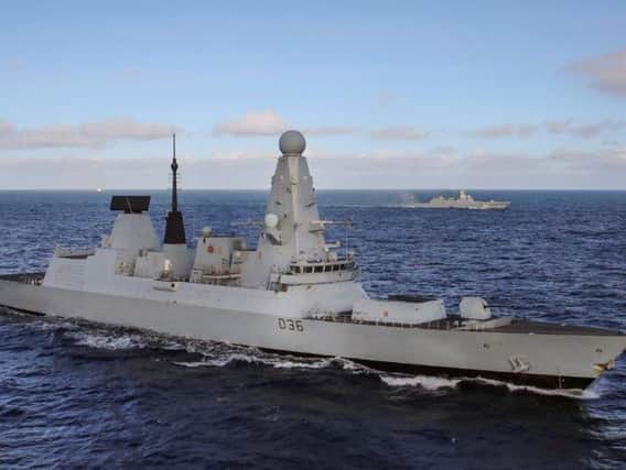 HMS Defender, armed to the teeth with spinny things and a spiky ball.