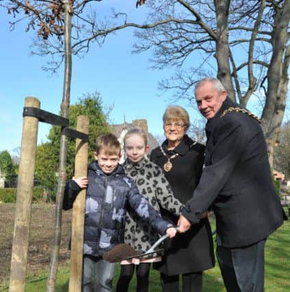 The Deputy Mayor Coun Norman Dick marks the 150th anniversary of the opening of Jarrow Cemetery, with Deputy Mayoress Jean Williamson, and youngsters Jacob Hill and Orla Fagan.