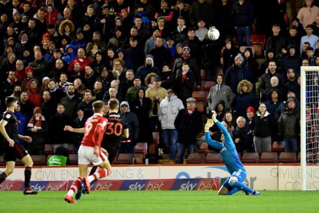 Jon McLaughlin makes an important save in the goalless draw with Barnsley.