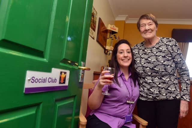 Palmersdene Care Home appeal for new home bar. Deputy manager Megan Graves with resident Mary Jordan