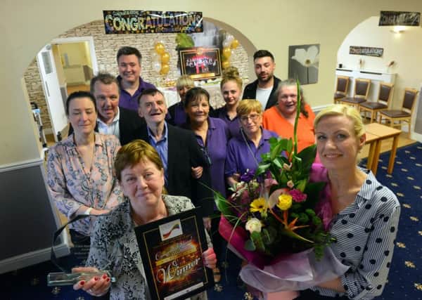 Harmony House carer Norma Jewitt wins national award. With manager Kelly Wilson.