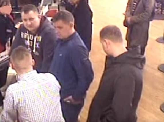 A CCTV image of men police are keen to speak to.