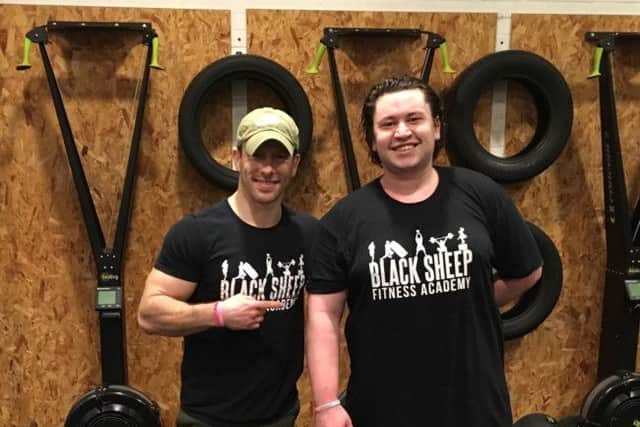 David John Hopper (right) with Lee Tiffin, owner of Black Sheep Fitness Academy.
