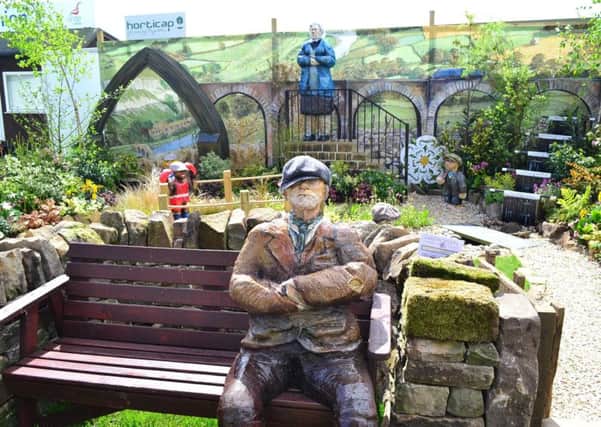 Horticap's Last of the Summer Wine show garden with life-size papier mache Compo.