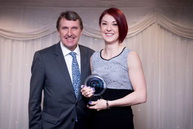 Cognitive Behaviour Therapist Victoria Cowens received the award for Outstanding Contribution from Chief Executive Ken Bremner
