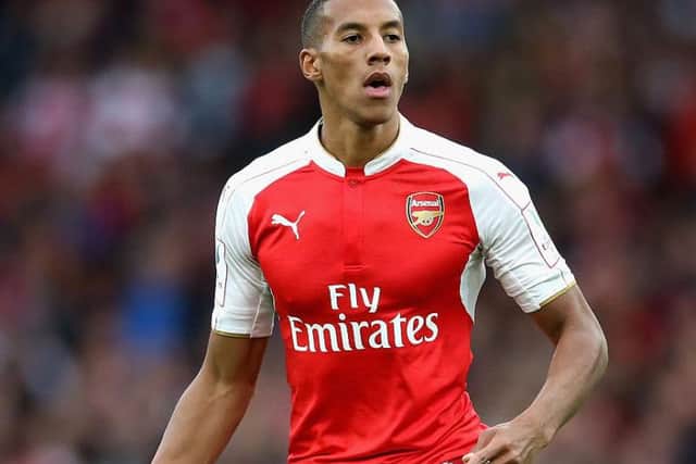 Isaac Hayden playing for Arsenal.