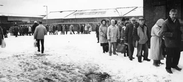 Pensioners queuing up for free mince in February 1991.