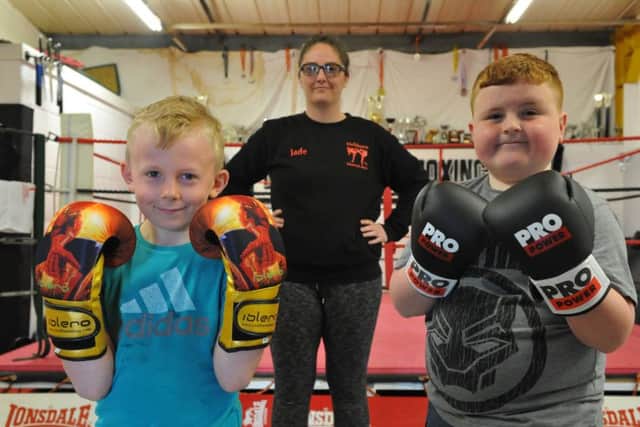 Martial Arts coach Jade Orne at Hebburn Matial Arts Centre, with youngsters Jack Ingham and Ryan Power.
