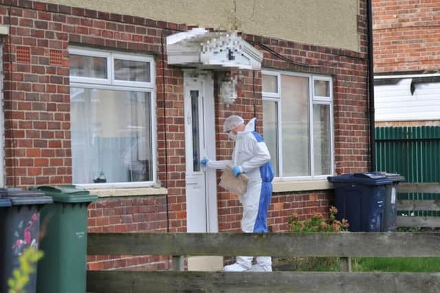 Police carry out inquiries in Thames Avenue, Jarrow.