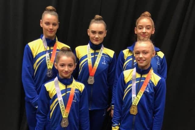 Back row, from left, Chloe Heley, Megan Neal, Morgan Nelson. Front, from left, Ruby Oliver and Lily Gladman with their medals.