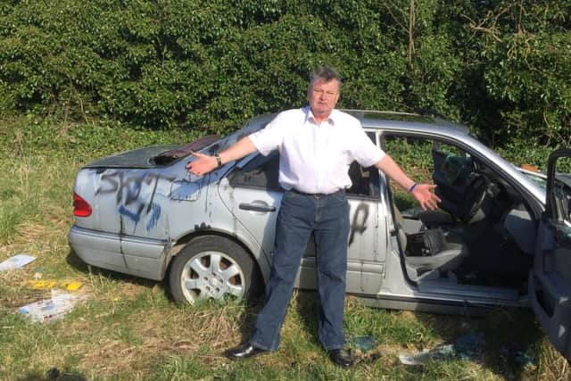 Coun Milburn claims he is being targeted because of a race row he is involved in