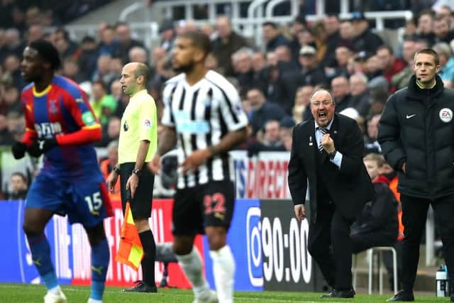 Rafa Benitez shouts at his players.