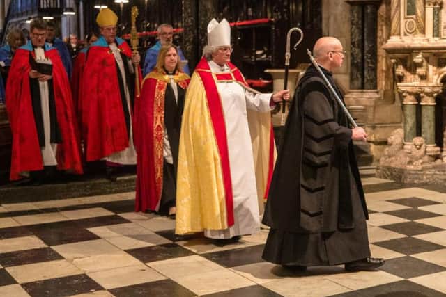 Bishop Sarah processes out of Durham Cathedral following her welcome and installation as Bishop of Jarrow. Picture By Keith Blundy.