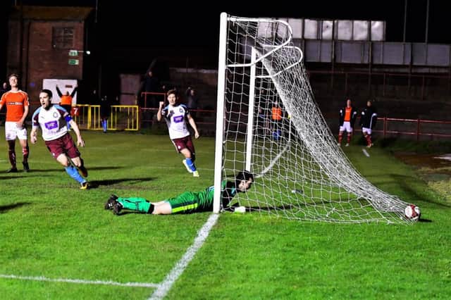 Nathan Lowe's shot creeps over the line for Shields' second. Pics: Kev Wilson