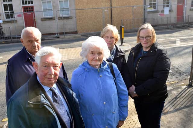 All Saints Church spire repair fund campaign as reached the half way point and are now in need church hall repair funding. From left Bryan Saunders, Keith Higgin, Jean Higgin, Anne Hudson and Jenny Grant
