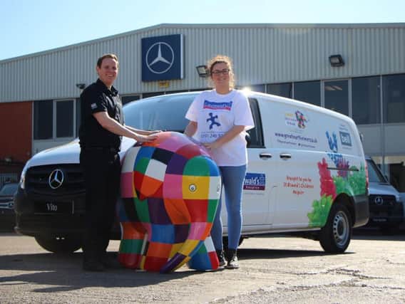 Matt Eyres,Business Development Manager at Bell Truck and Van with Ashley Elliott, Fundraising Team Manager at St Oswald's Hospice.