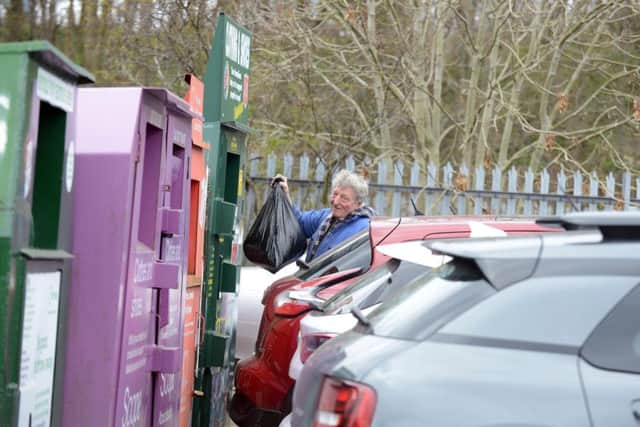 Norman Moore concerns with the parked cars blocking the recycling area.