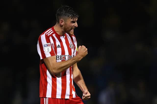 GILLINGHAM, UNITED KINGDOM - AUGUST 22:  Jack Baldwin of Sunderland celebrates at he full time whistle during the Sky Bet League One match between Gillingham and Sunderland at Priestfield Stadium on August 22, 2018 in Gillingham, United Kingdom.  (Photo by Naomi Baker/Getty Images)