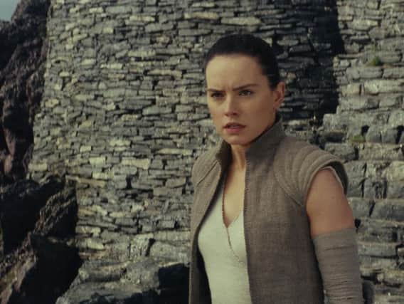 Daisy Ridley as Rey in Star Wars.