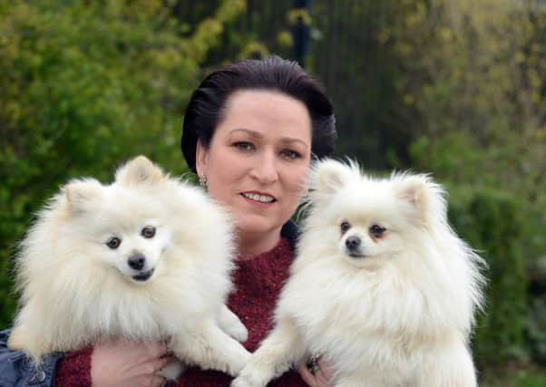Carol Coxon with her dogs from left Georgie and Bentley