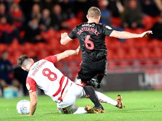 Lee Cattermole in action against Ben Whiteman during the reverse fixture earlier in the season.