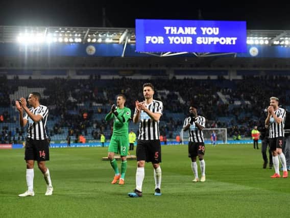 Martin Dubravka, second left, and his team-mates applaud Newcastle's fans.