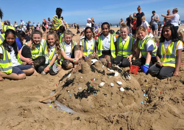 Marine Park Primary School pupils taking part in last year's Sandcastle Challenge at Sandhaven Beach.