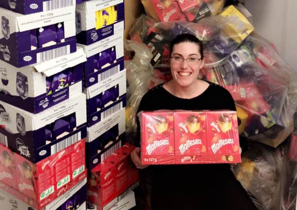 Aimee Burns, from Hope 4 Kidz, with some of the 534 Easter eggs donated by staff at Siemens in Hebburn.