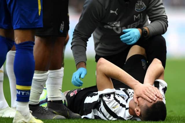 Miguel Almiron receives treatment.