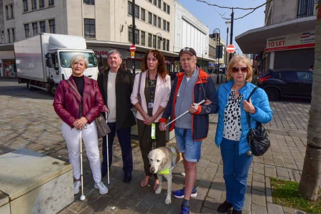 Sandra Nesbitt (left) and her blind friends Ivan Lunn chairman South Tynesude Visual Imparement Council, Linda Oliver of Guide Dogs for the Blind with 'Zoe', Peter Bennetts of RNIB and Marion Stead secretary of Visual Impairment Council, are calling for action to help blind people at the Market Place, South Shields