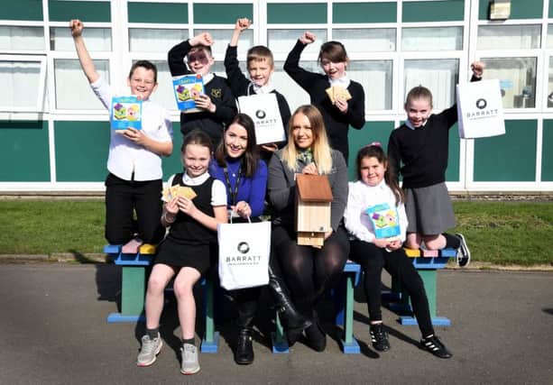 Pupils from Toner Avenue Primary School with their wildlife kits